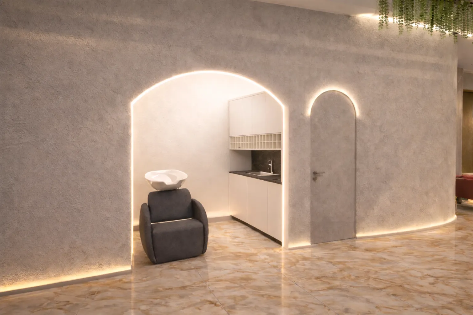 Hair wash station with arch lighting and marble floor